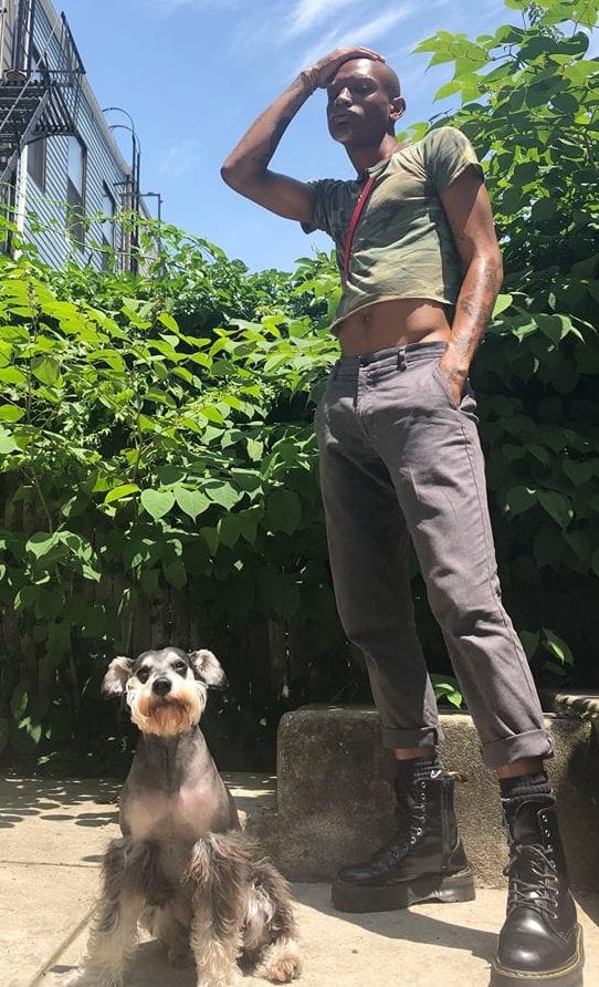 Jalen Dominique with his dog Gio. (How much do pets cost?)