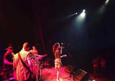 How to Start a Record Label: A ‘Clever’ Story | Photo of singer-songwriter Oryan performing onstage at the Madison Theatre in Covington, KY