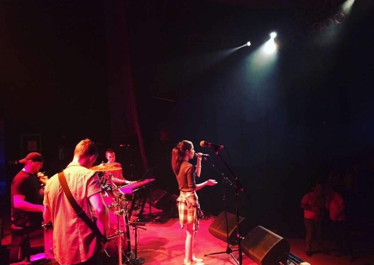How to Start a Record Label: A ‘Clever’ Story | Photo of singer-songwriter Oryan performing onstage at the Madison Theatre in Covington, KY