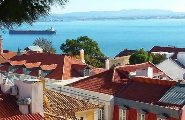 Things to Do During a Gap Year: Work Abroad Programs 101 Things to Do During a Gap Year: Work Abroad Programs 101 | Landscape shot of houses overlooking the ocean | Photo by Daye Deura